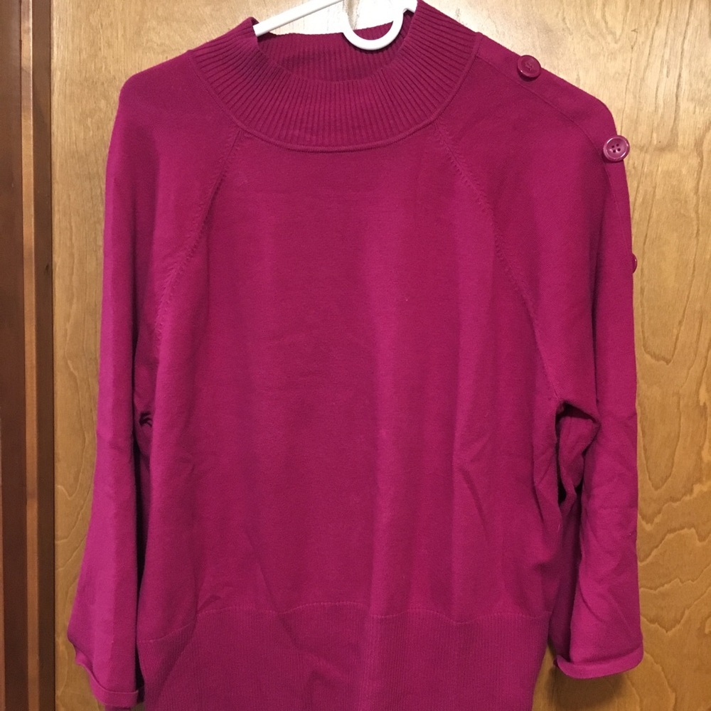 Burgundy sweater with buttons down one sleeve